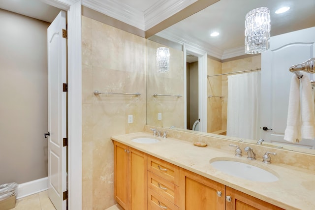 bathroom with a shower with shower curtain, ornamental molding, tile patterned flooring, and vanity