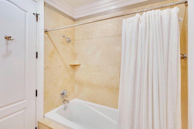 bathroom with crown molding and shower / bath combo