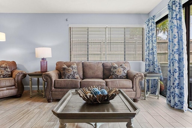 living room with light hardwood / wood-style floors