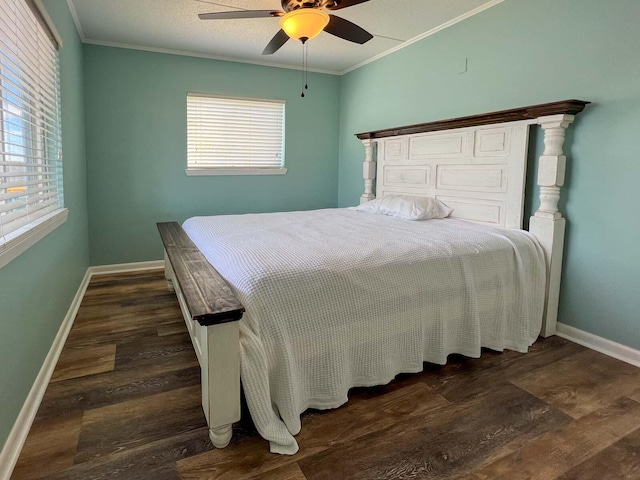 bedroom with ornamental molding, a textured ceiling, ceiling fan, and dark hardwood / wood-style flooring