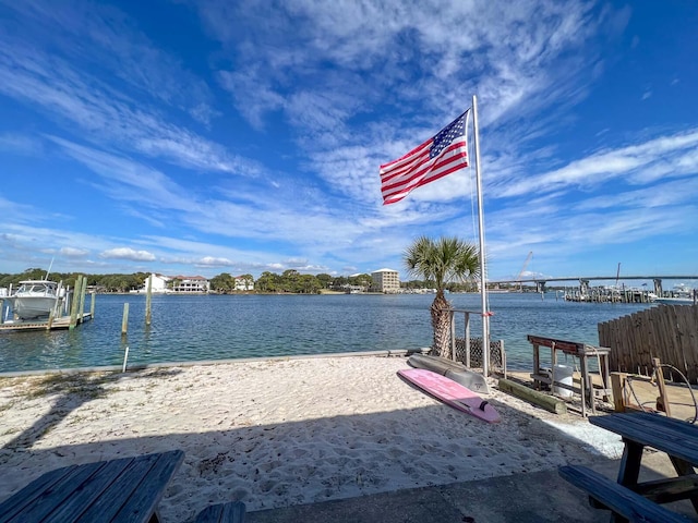 dock area with a water view