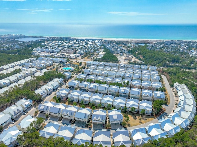 bird's eye view with a water view and a residential view