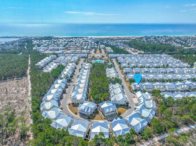 aerial view with a residential view and a water view