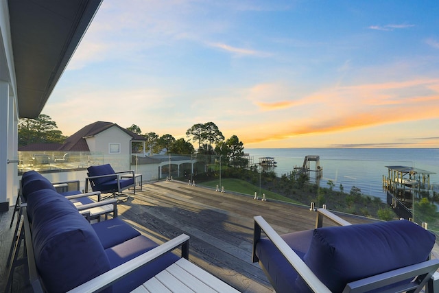 deck at dusk with a water view