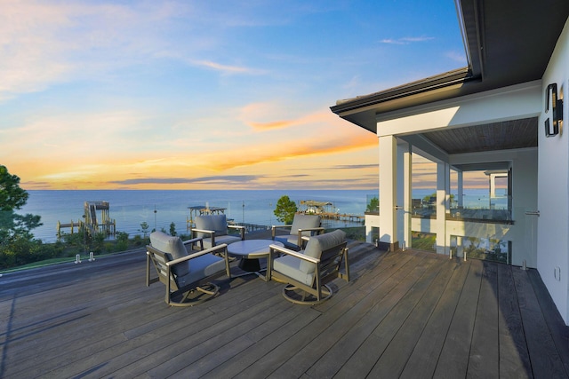 deck at dusk with a water view