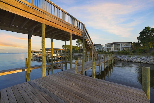 dock area with a water view