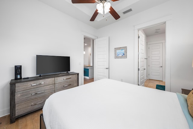 bedroom featuring light hardwood / wood-style floors and ceiling fan