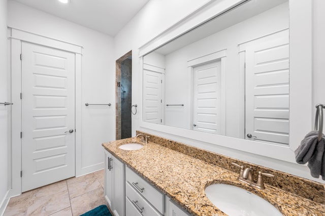 bathroom featuring vanity and walk in shower