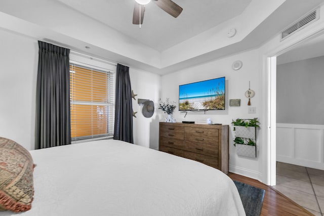 bedroom featuring dark wood-type flooring and ceiling fan