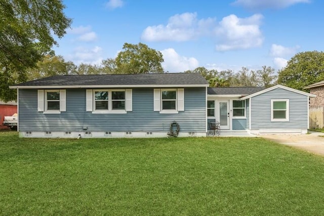 view of front of home with a front yard, crawl space, and a patio area