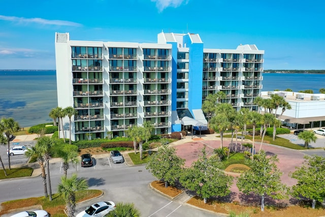 view of building exterior featuring a water view