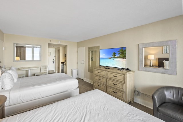 bedroom featuring dark hardwood / wood-style floors