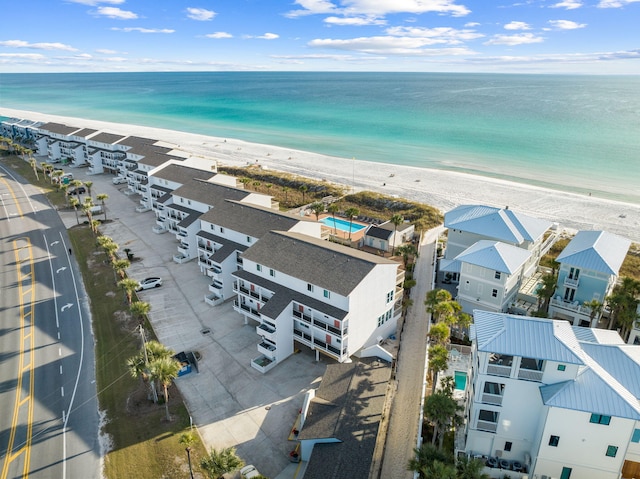 aerial view featuring a view of the beach and a water view