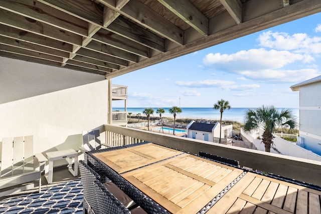 balcony featuring a water view