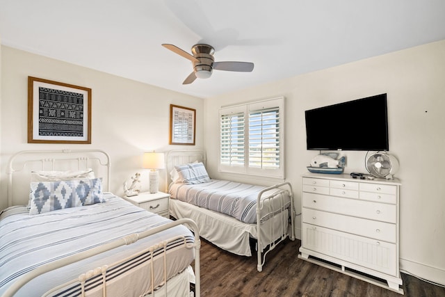 bedroom featuring dark wood-type flooring and ceiling fan