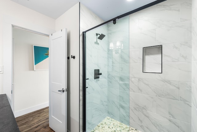 23011 Front Beach Rd Unit 65, Panama City Beach, FL 32413 - full bath with a shower stall, wood finished floors, and baseboards