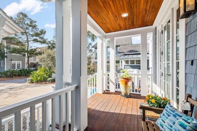 sunroom / solarium with wood ceiling