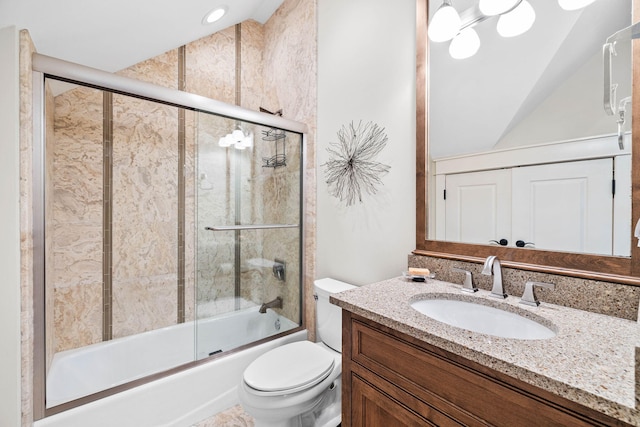 full bath featuring vaulted ceiling, shower / bath combination with glass door, vanity, and toilet