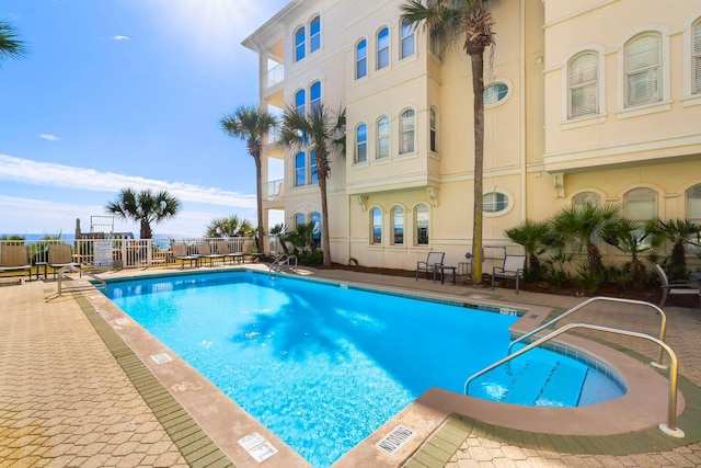 view of pool featuring a patio