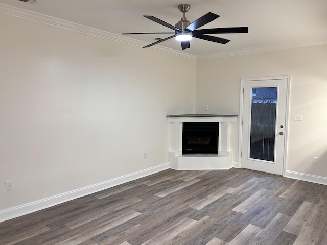 unfurnished living room with crown molding, wood-type flooring, and ceiling fan