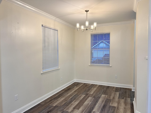 empty room with an inviting chandelier, ornamental molding, and dark hardwood / wood-style floors