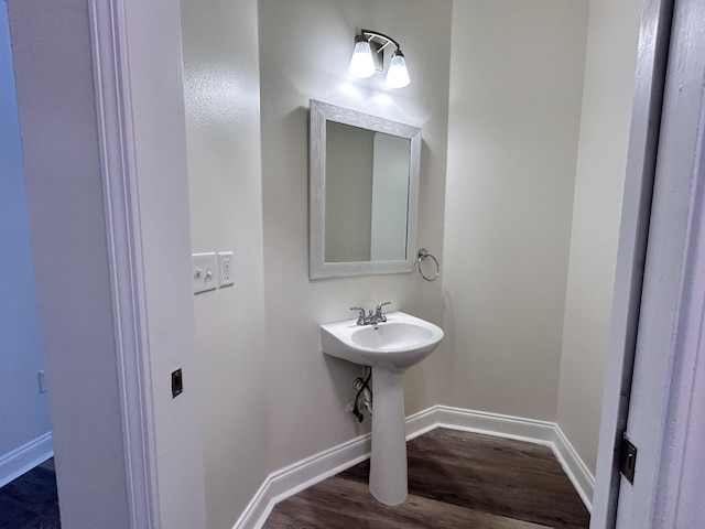 bathroom featuring wood-type flooring