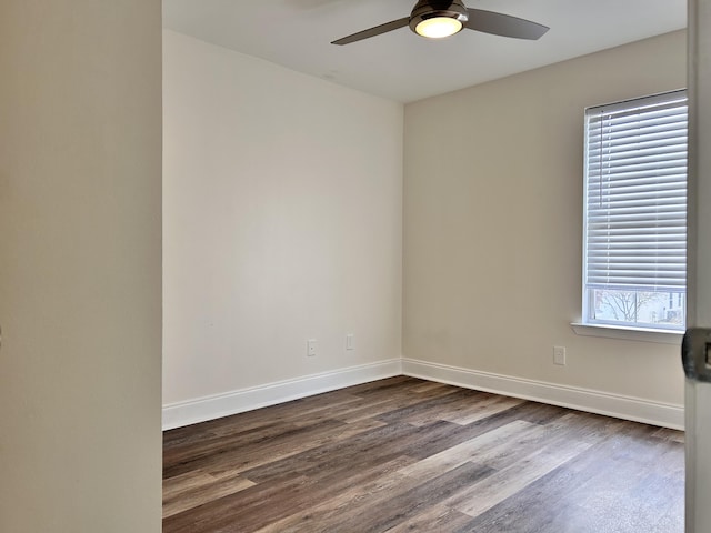 empty room featuring hardwood / wood-style floors and ceiling fan