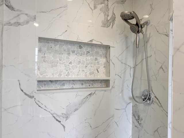 room details with a tile shower