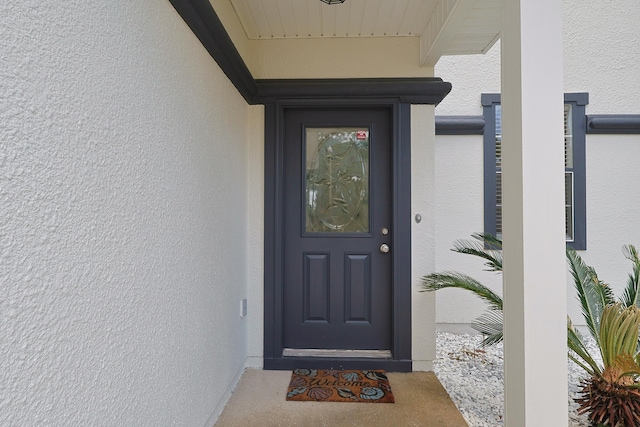 149 Legion Park Loop, Miramar Beach, FL 32550 - view of exterior entry featuring stucco siding