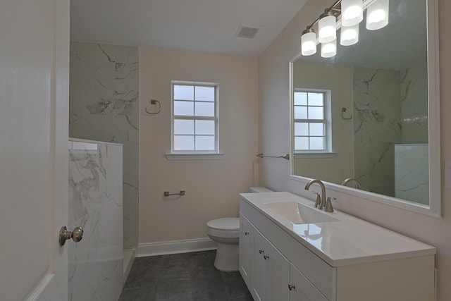 149 Legion Park Loop, Miramar Beach, FL 32550 - bathroom with toilet, vanity, a marble finish shower, and baseboards