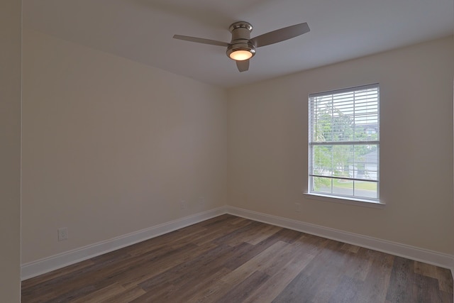 149 Legion Park Loop, Miramar Beach, FL 32550 - unfurnished room featuring dark wood-type flooring, baseboards, and a ceiling fan