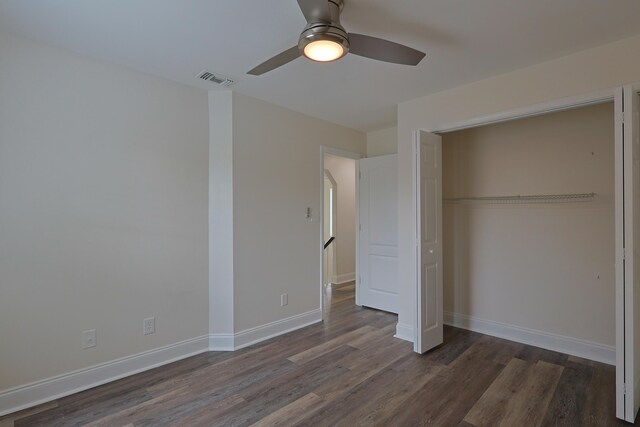 149 Legion Park Loop, Miramar Beach, FL 32550 - unfurnished bedroom featuring wood finished floors, a closet, baseboards, and a ceiling fan