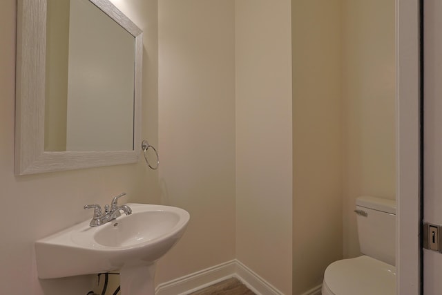 149 Legion Park Loop, Miramar Beach, FL 32550 - half bath with toilet, baseboards, and a sink