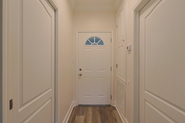 149 Legion Park Loop, Miramar Beach, FL 32550 - doorway featuring dark wood finished floors and crown molding