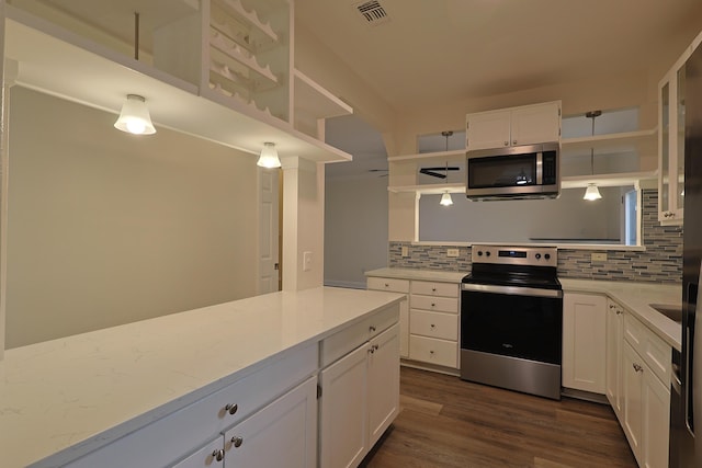 149 Legion Park Loop, Miramar Beach, FL 32550 - kitchen featuring open shelves, stainless steel appliances, backsplash, and white cabinetry