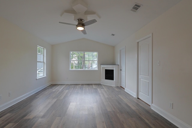 149 Legion Park Loop, Miramar Beach, FL 32550 - unfurnished living room with lofted ceiling, dark wood finished floors, ceiling fan, a fireplace, and baseboards