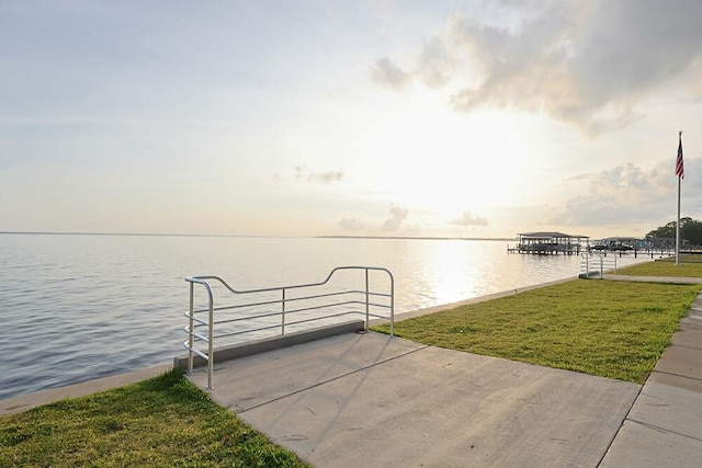 149 Legion Park Loop, Miramar Beach, FL 32550 - dock area with a water view and a lawn