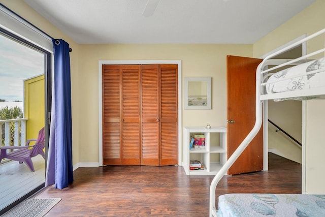 8468 Gulf Blvd # Ut-4, Navarre, FL 32566 - bedroom featuring ceiling fan, dark hardwood / wood-style floors, and a closet