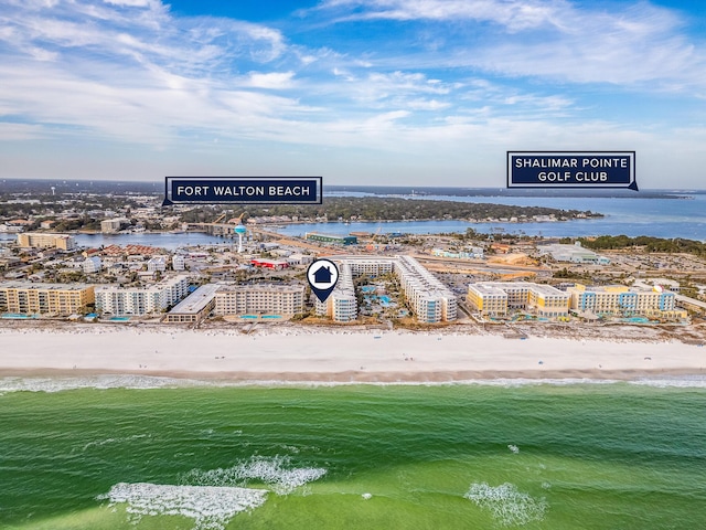 aerial view with a beach view and a water view