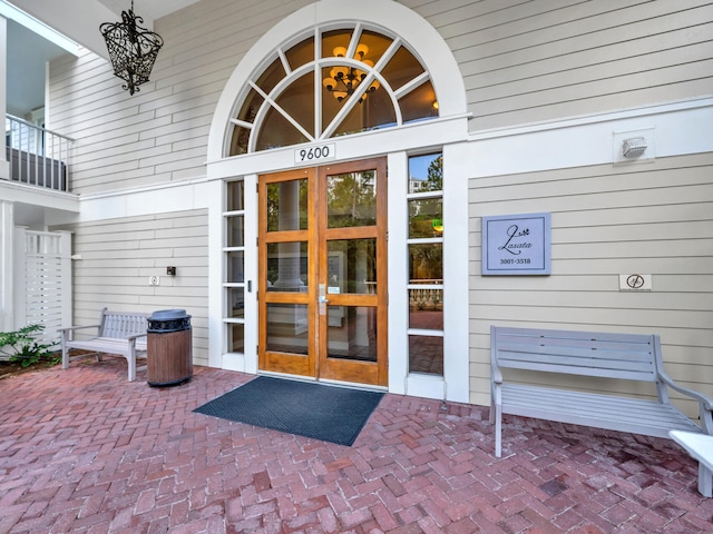 entrance to property featuring french doors