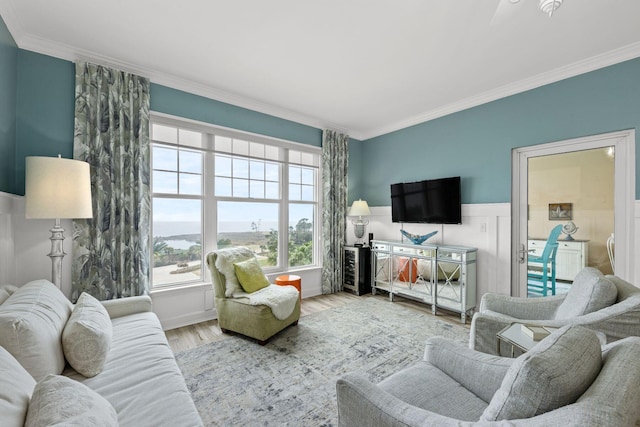 living room featuring ornamental molding and hardwood / wood-style floors