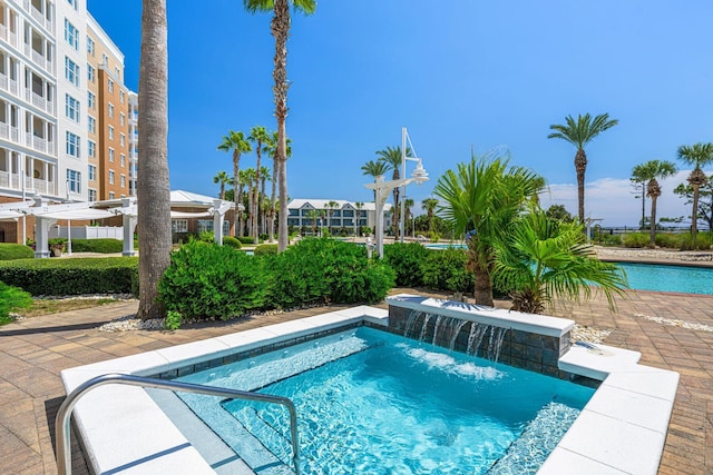 view of pool featuring pool water feature