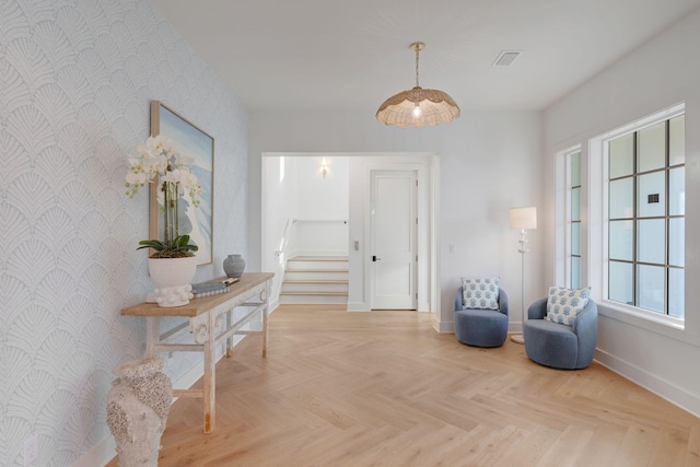 living area with light parquet flooring