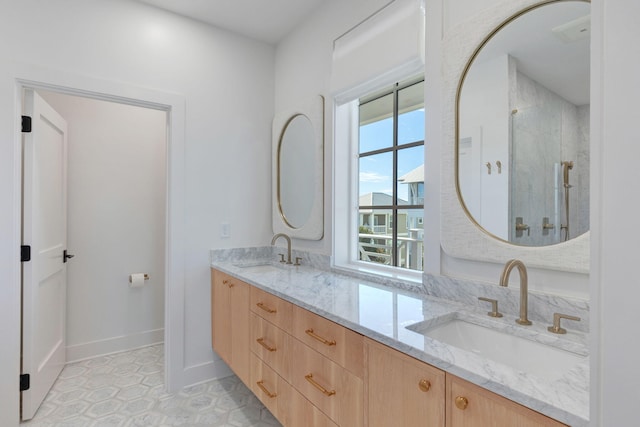 bathroom featuring vanity and a shower with door