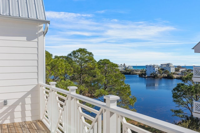 balcony featuring a water view