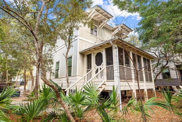 view of front facade featuring a sunroom