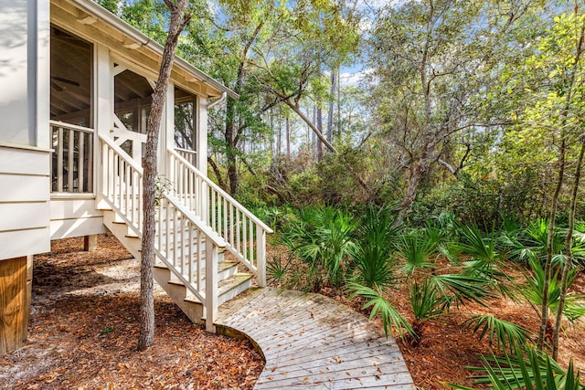 view of yard with a sunroom