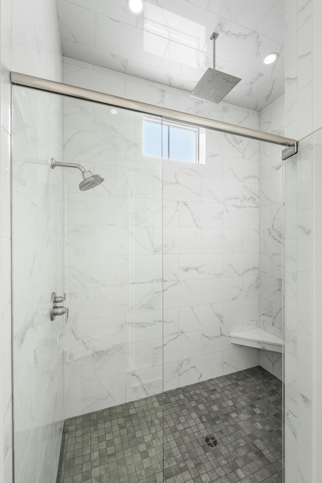 full bathroom with a shower stall