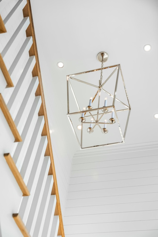 room details featuring recessed lighting and an inviting chandelier