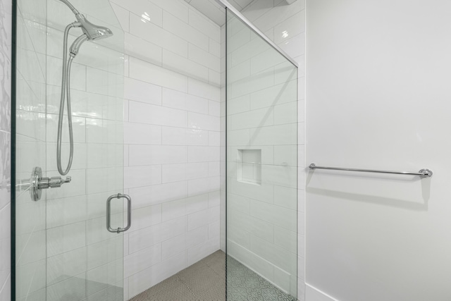 full bathroom featuring a stall shower